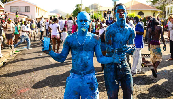 Blue painted revellers at Carriacou carnival.