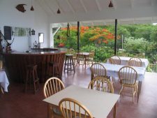 Cottage rental, car hire, bar and restaurant the Green Roof Inn on Carriacou.